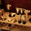 Animal head wine stoppers on wine bottles