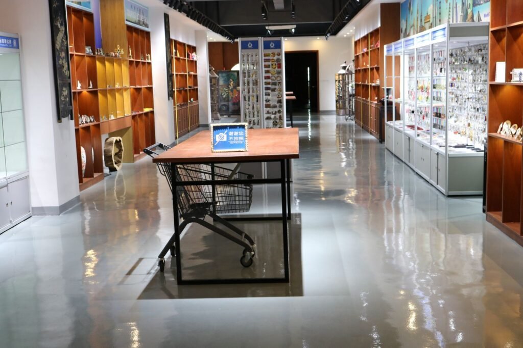 Kingtop metal gift factory showroom with display cabinets of metal souvenirs, medals and trophies