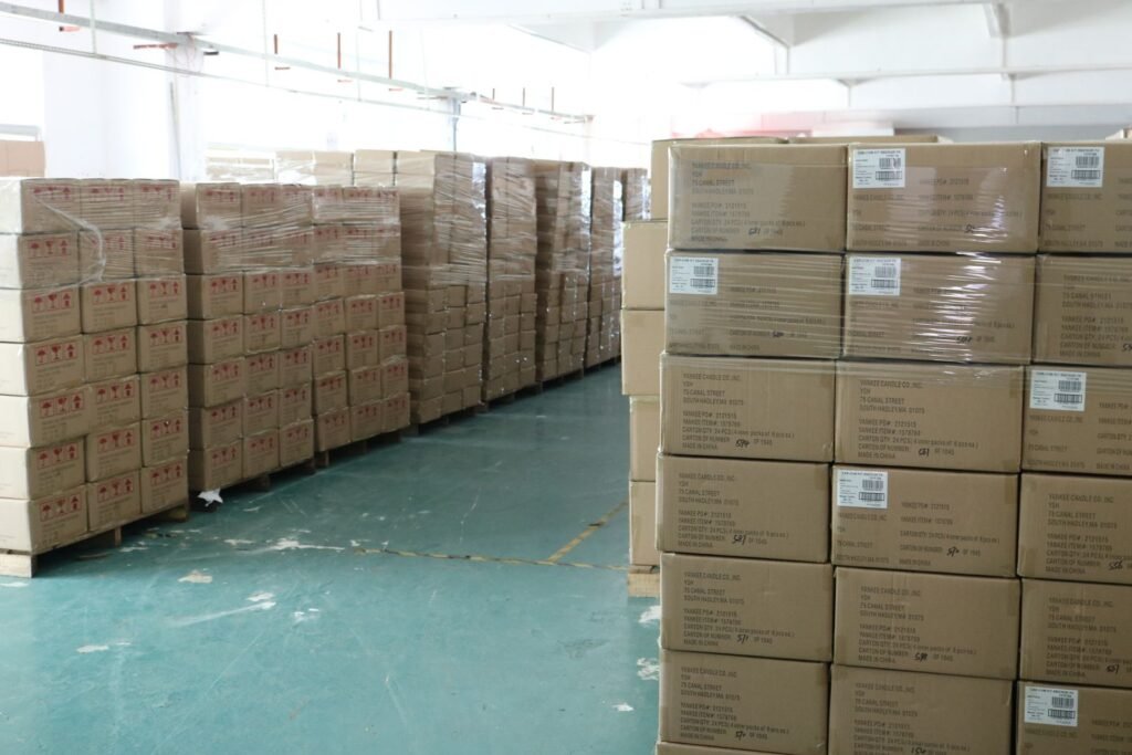 Palletised cartons of finished custom metal gifts ready for shipment in the Kingtop factory warehouse