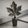 Bronze maple leaf wine stopper with detailed leaf veining