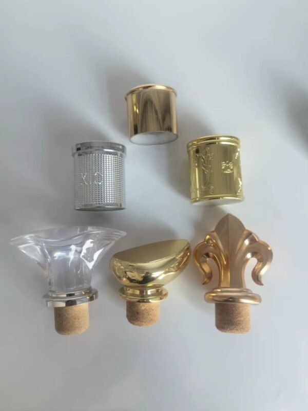 Assorted metal wine stoppers in silver gold and copper finish options