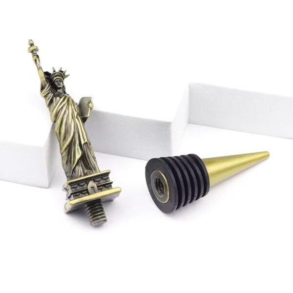 Souvenir wine stopper showing the removable top and sealing ring construction