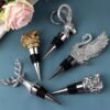 Rose gold deer head wine pourer inserted into a wine bottle