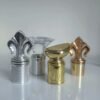 Metallic fleur de lis wine stopper in silver gold and copper finishes