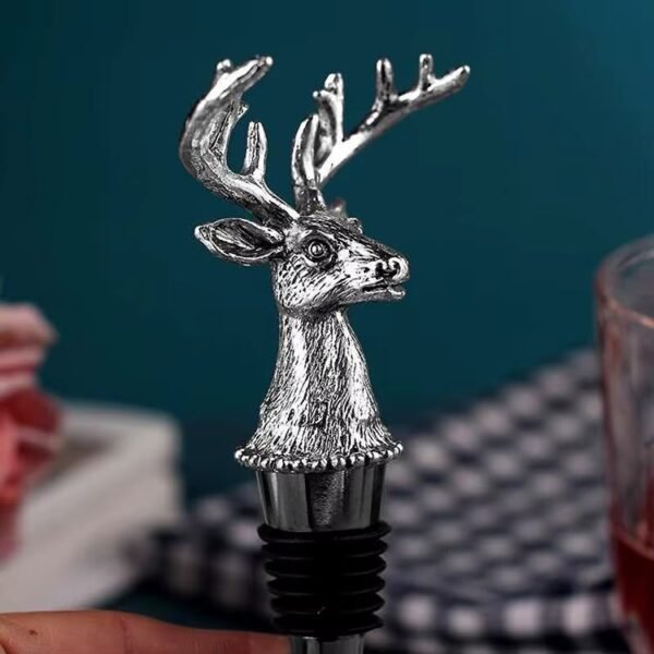 Silver plated deer antler wine pourer detail view with cork seal