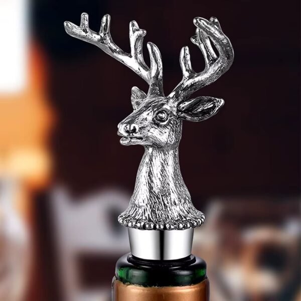Silver zinc alloy wine stopper with deer head detail on a wine bottle