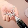 Silver plated deer antler wine pourer detail view with textured finish