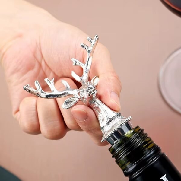 Silver plated deer antler wine pourer detail view with textured finish