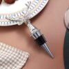 Zinc alloy wine stopper placed on a table setting for hospitality use